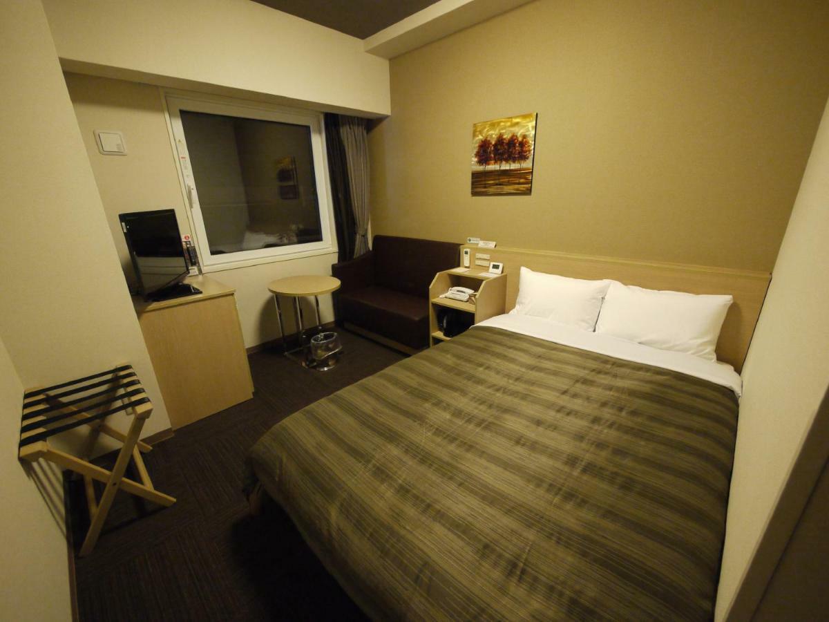 Hotel Route-Inn Kitakyushu-Wakamatsu Ekihigashi Exteriör bild