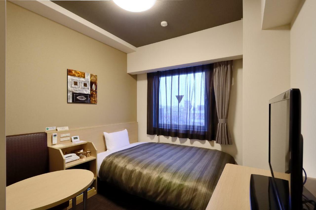 Hotel Route-Inn Kitakyushu-Wakamatsu Ekihigashi Exteriör bild